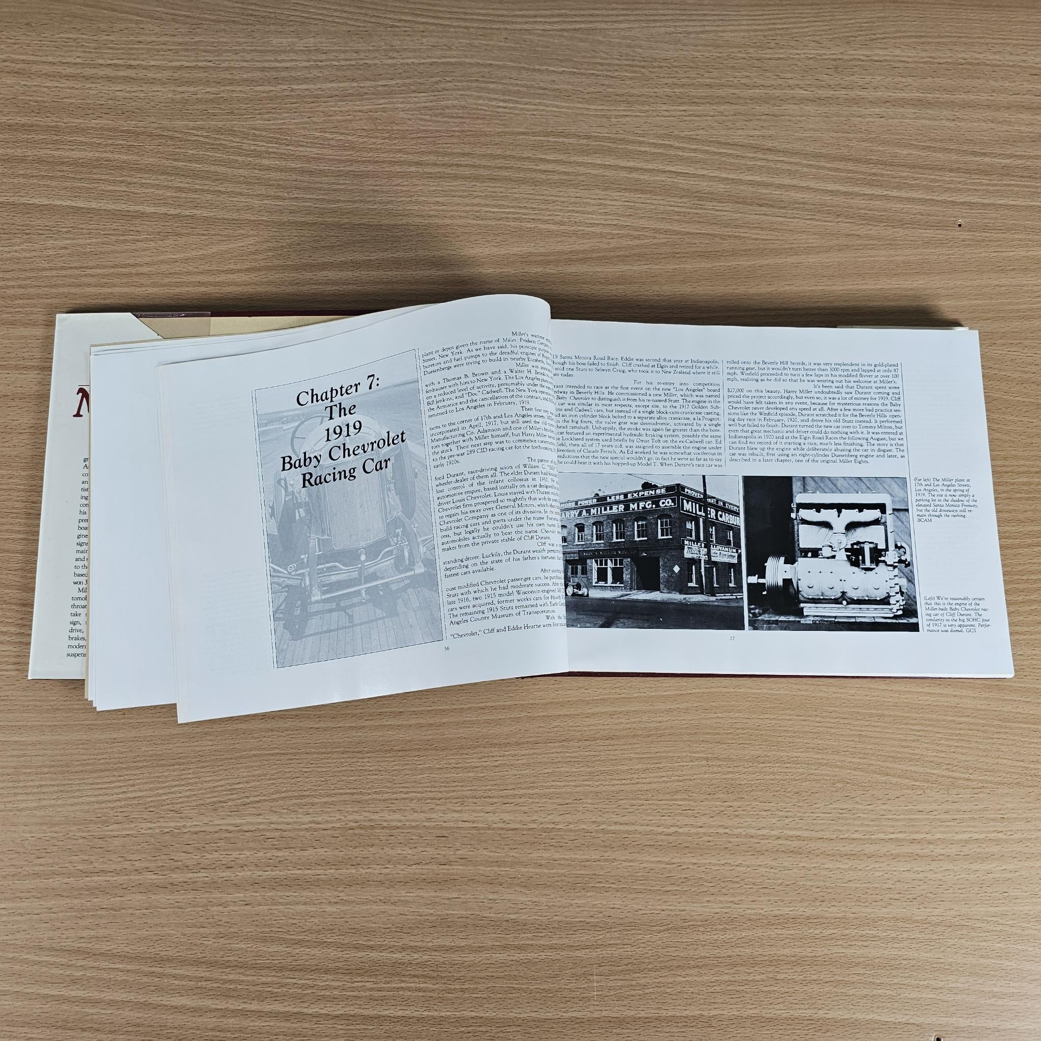 Miller Dynasty history book open with article pages and vehicle photos