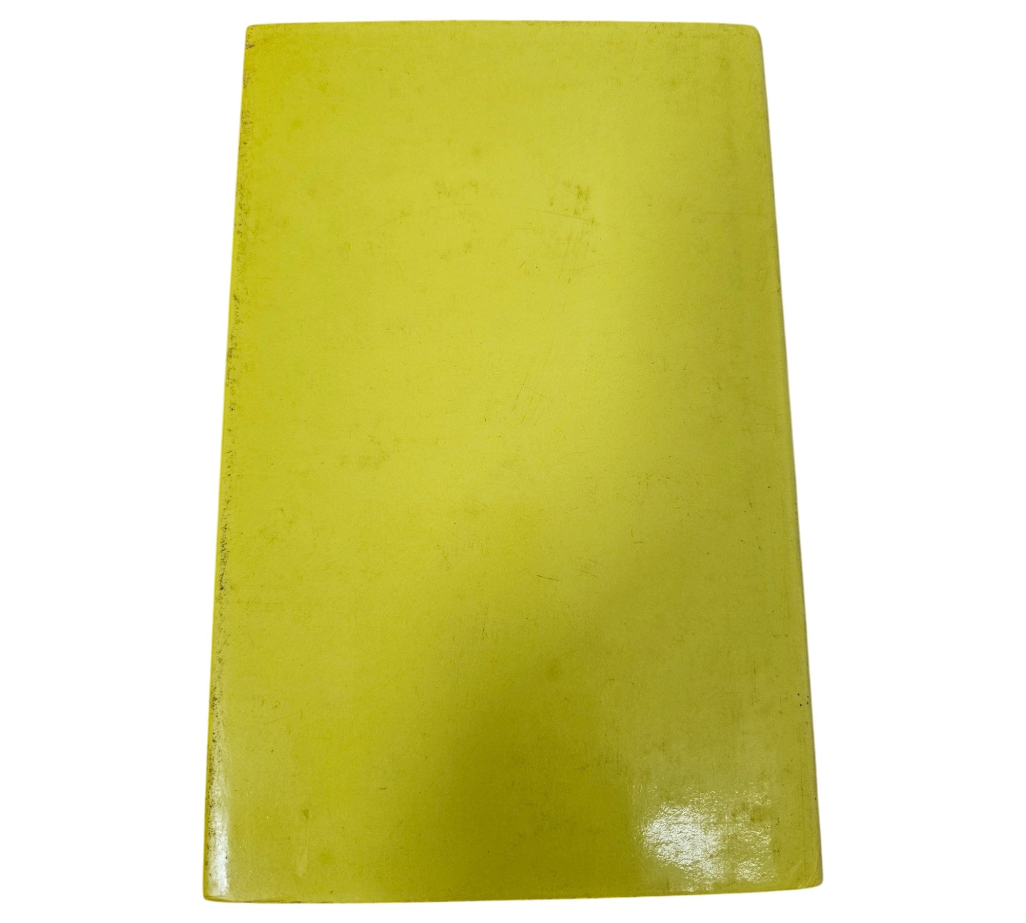 Automotive book back cover in solid yellow-green with no visible graphics