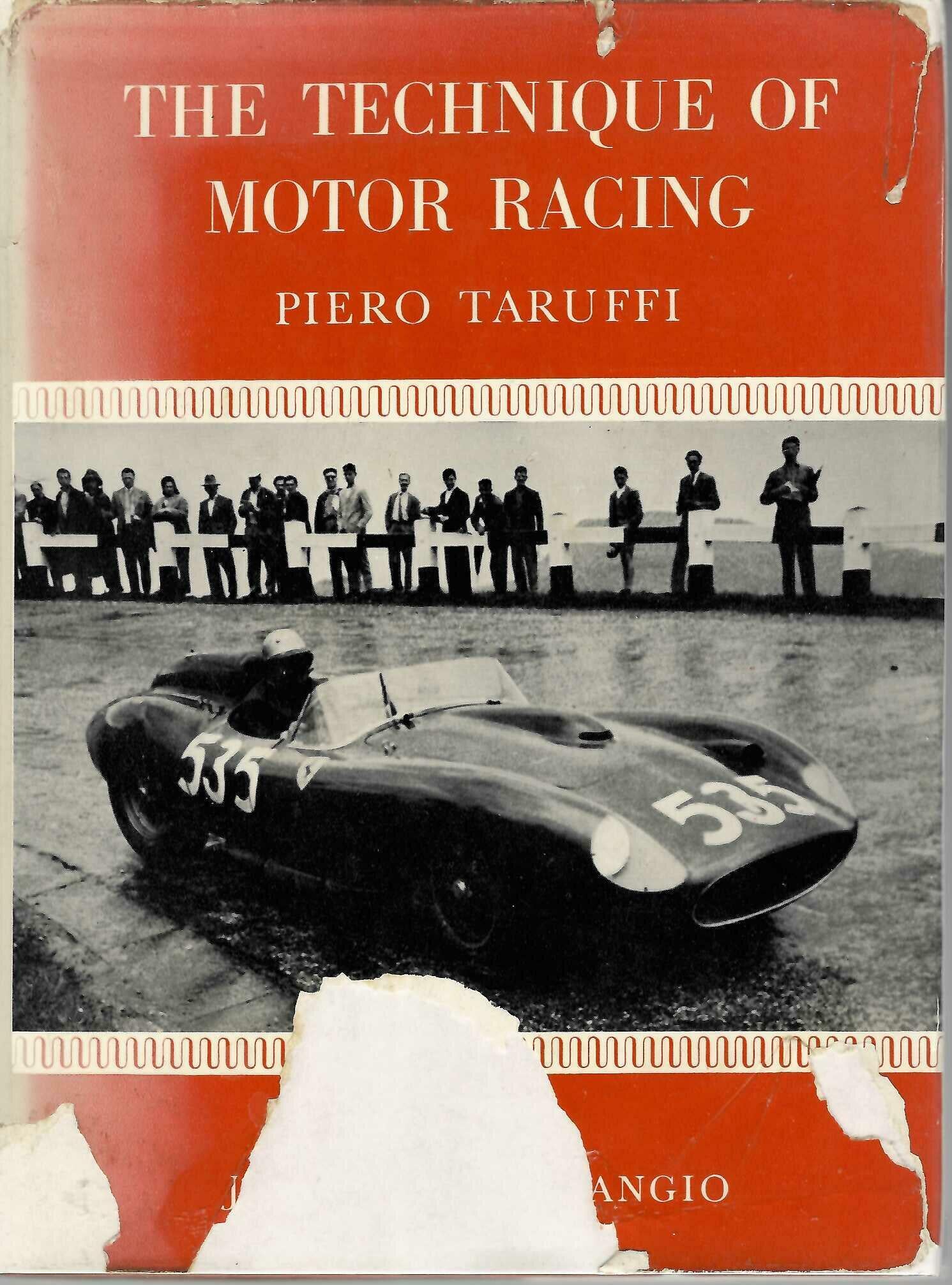 Motor racing book, red cover with title and author text