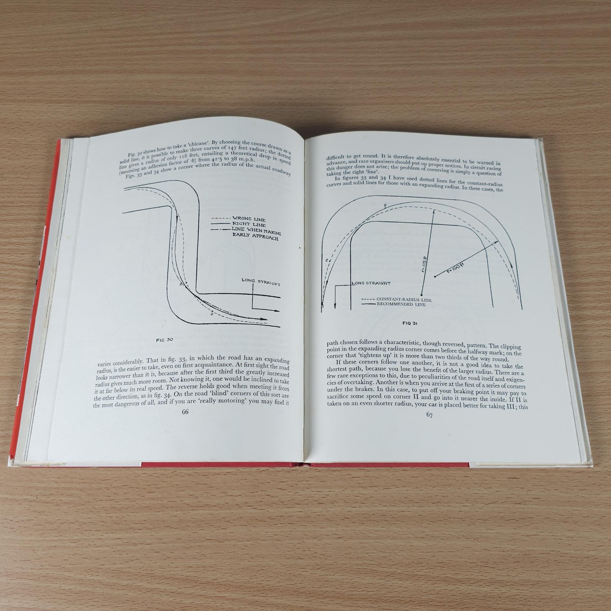 Vintage motor racing book, open pages with speed-curve charts and text.