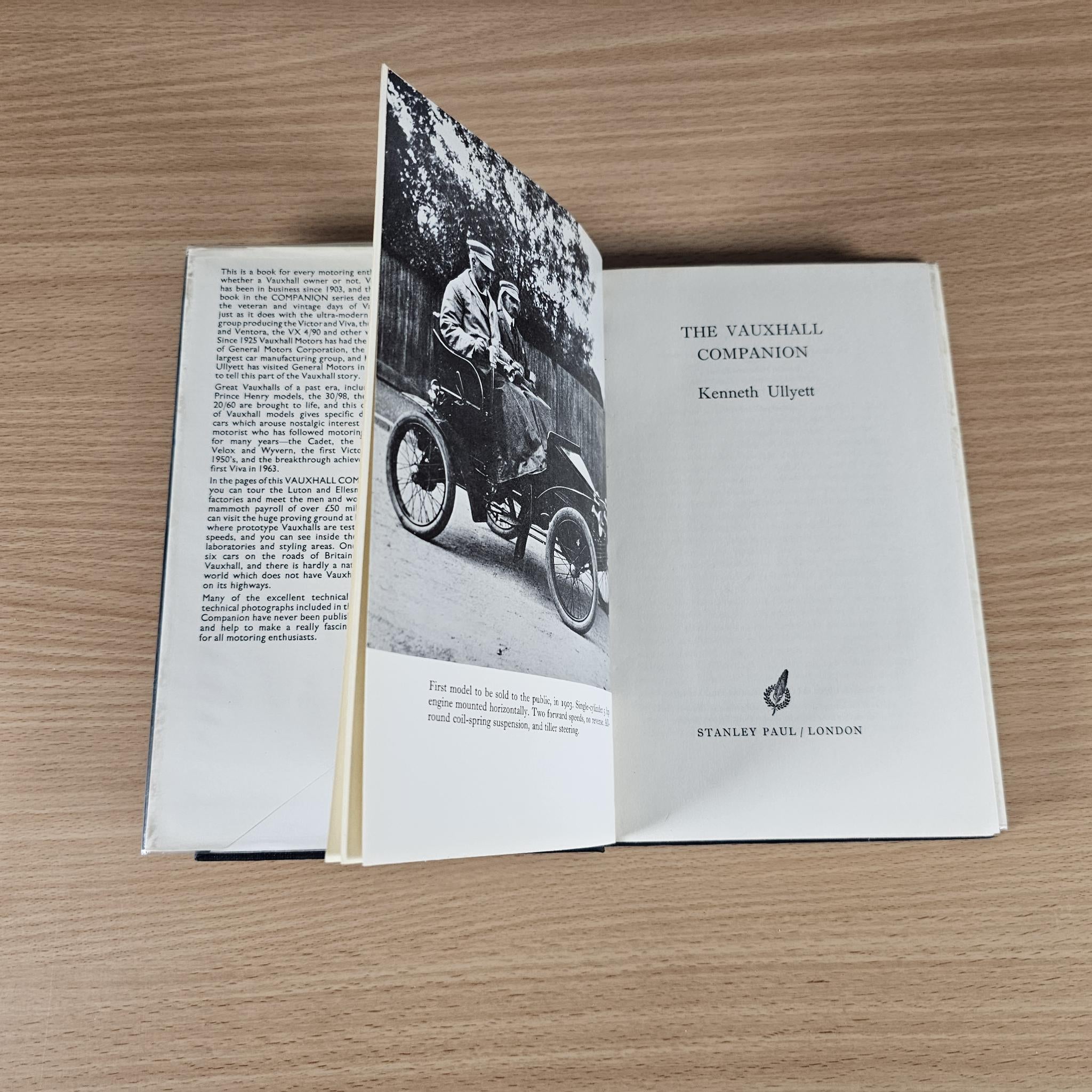 Open book with text and black-and-white car photo on The Vauxhall Companion pages