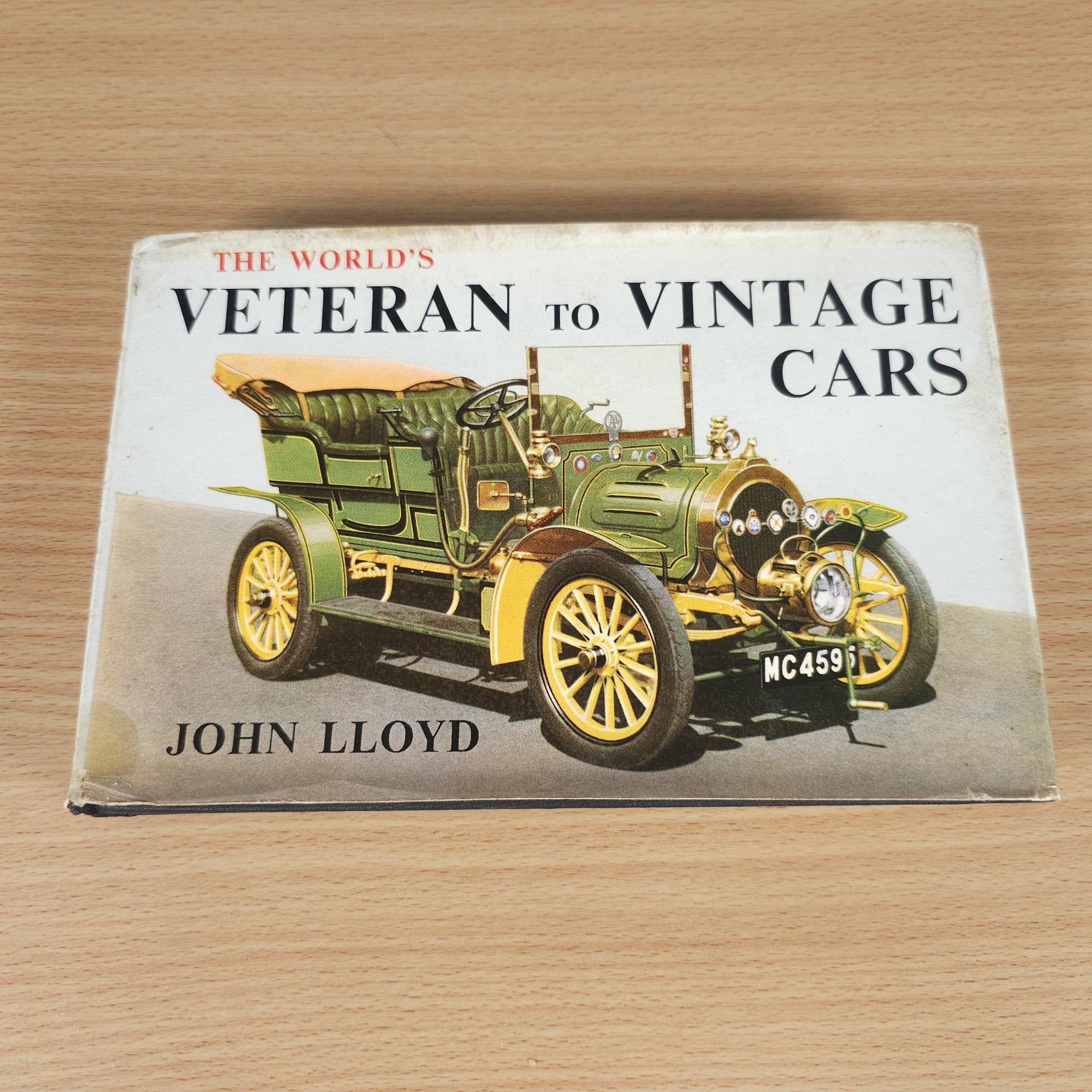 Vintage car book cover featuring a green classic car illustration