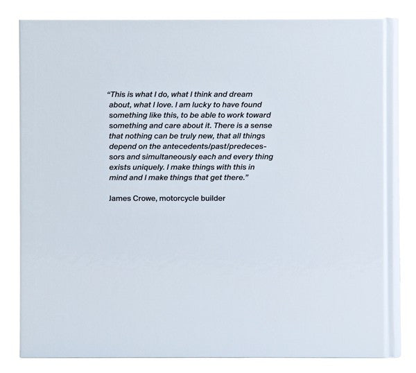 Motorcycle book open to a page with a quote and block of printed text