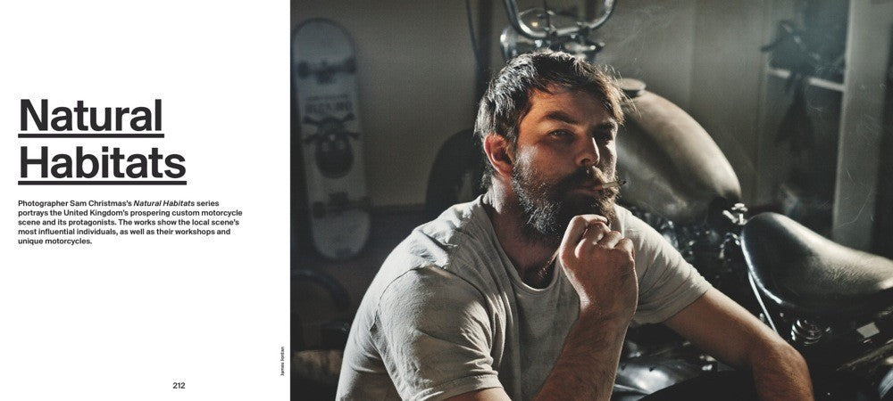 Motorcycle builder portrait with custom motorcycle in workshop
