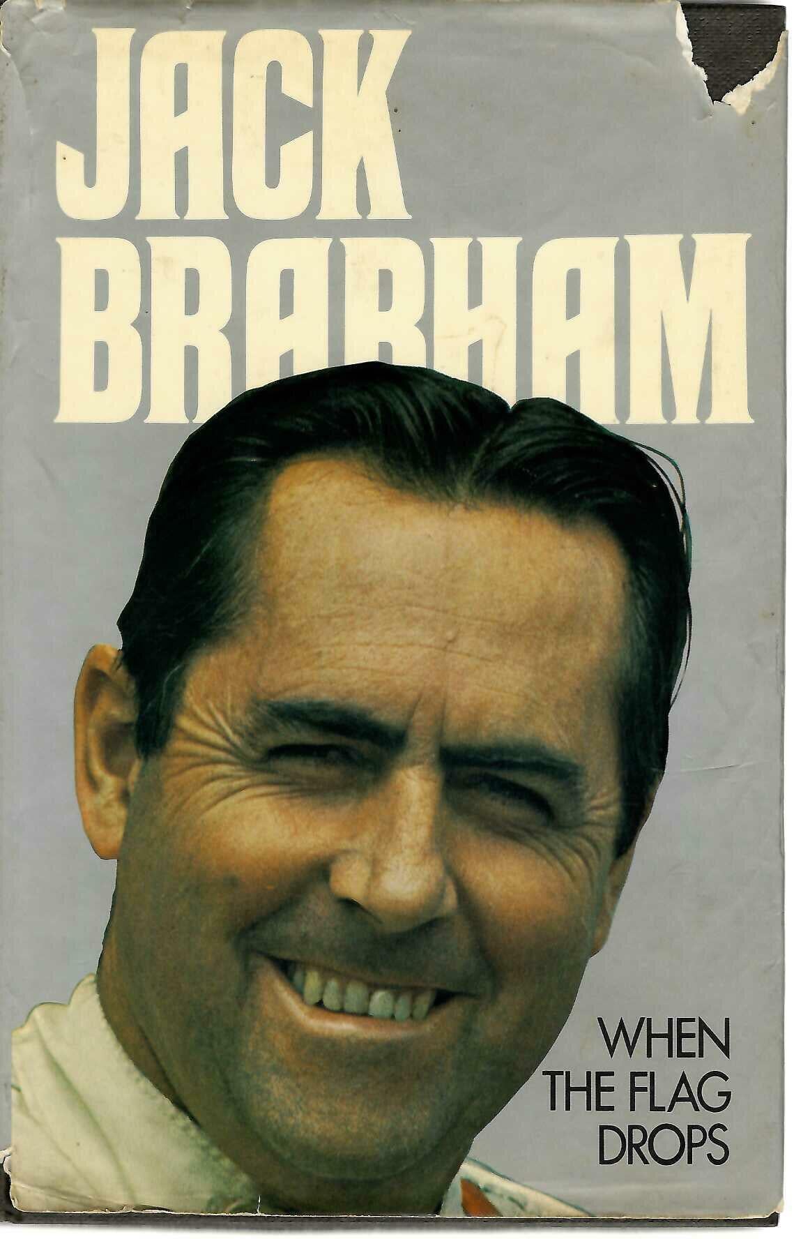 Hardcover autobiography book with Jack Brabham portrait on the cover, titled “When the Flag Drops”