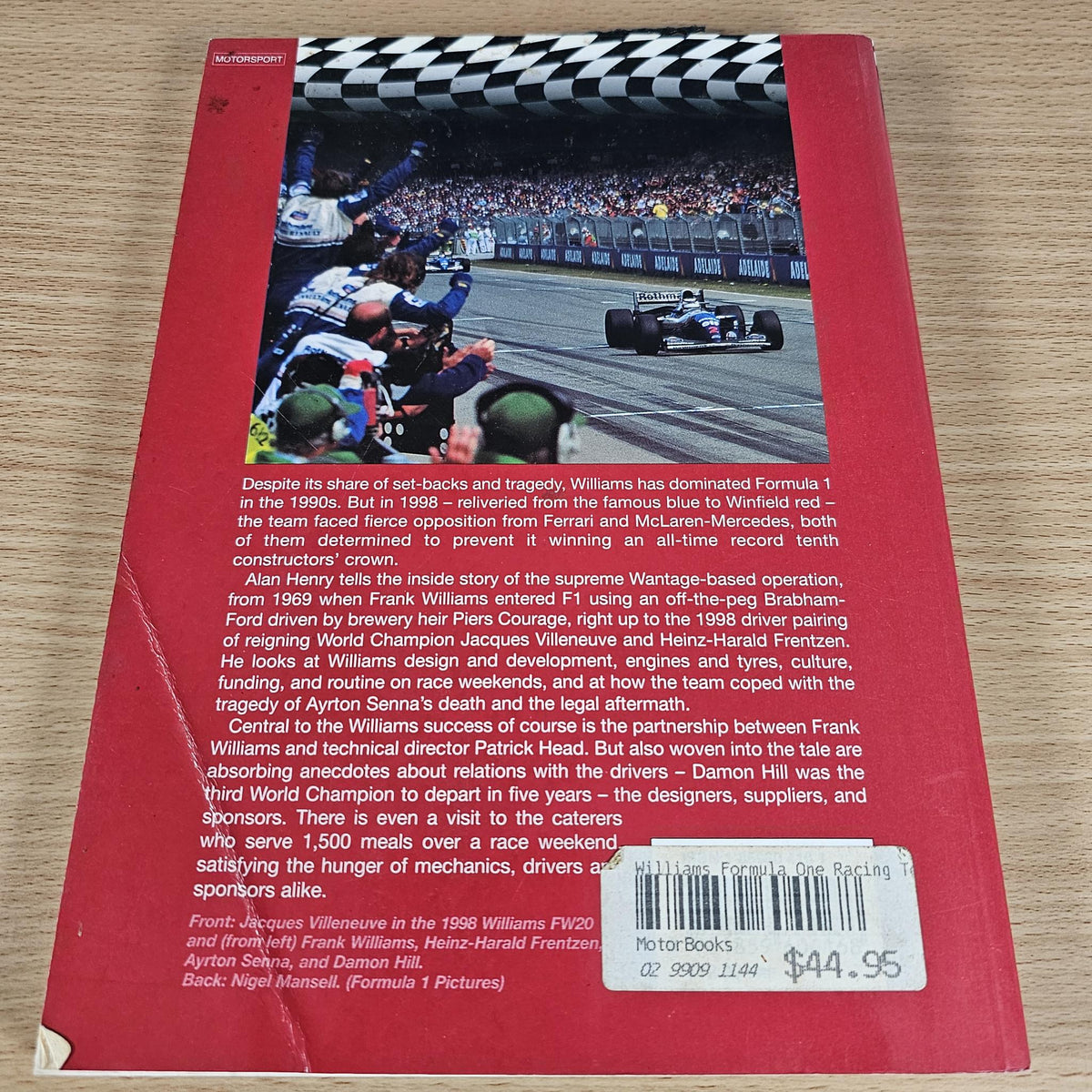 Williams Formula 1 racing team book back cover with action photo, text, barcode, and $44.95
