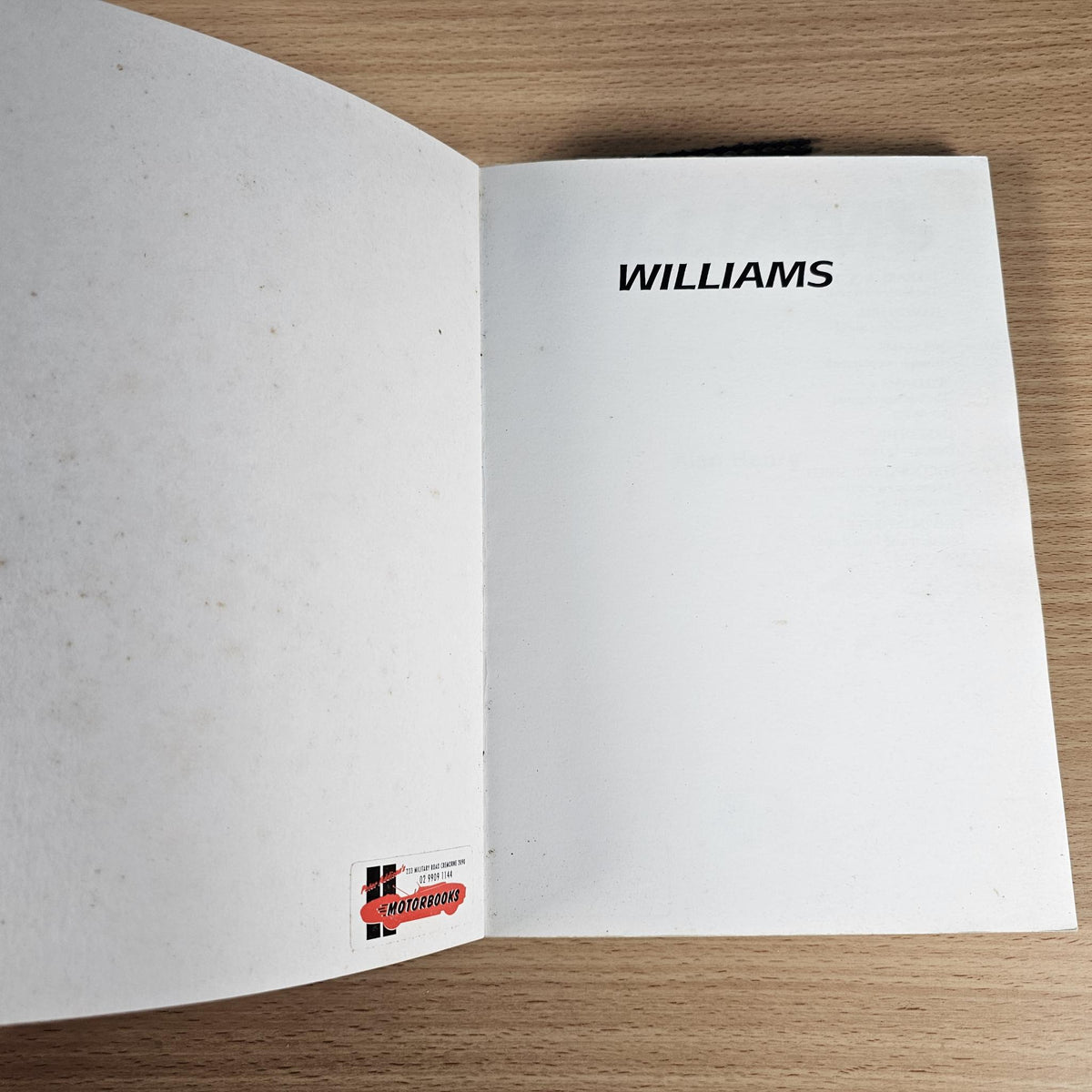 Blank white inside page with centered WILLIAMS header and small publisher logo