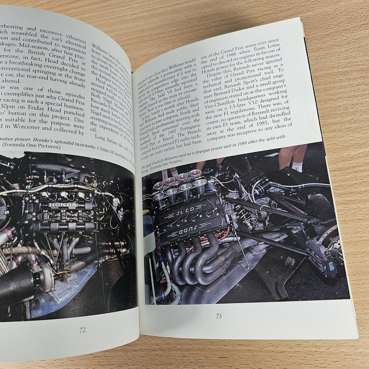Open book spread with close-up engine photos and descriptive black text